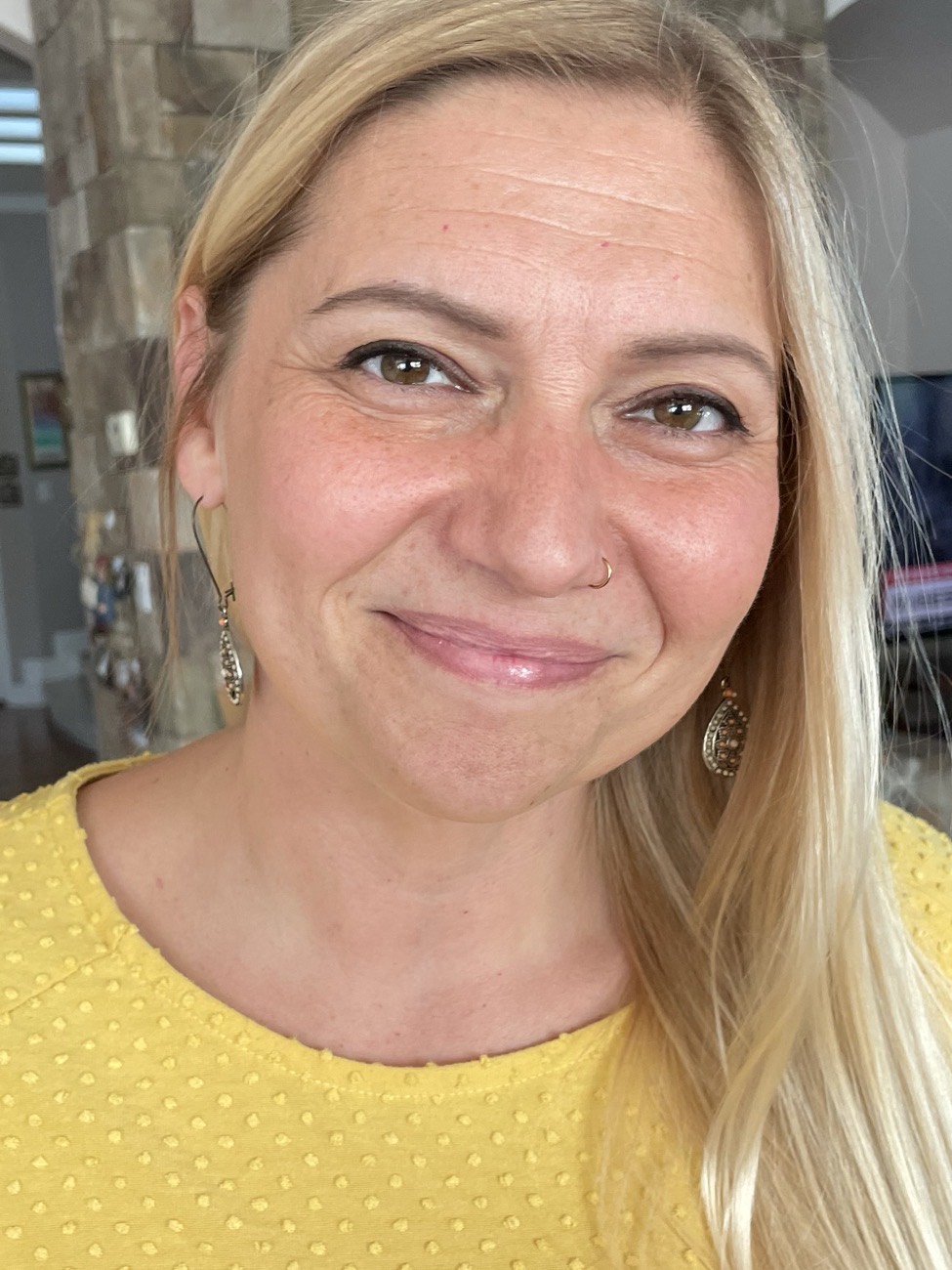 Stefanie Smith, smiling, looking directly at the camera
